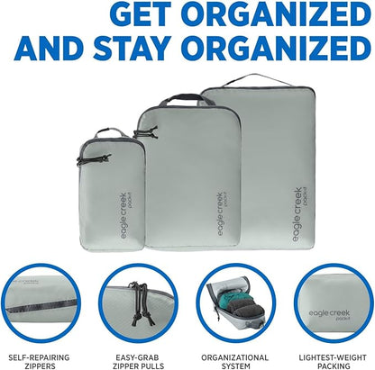 Eagle Creek Pack-It Isolate Cube Set - Packing Cubes for Stackable Storage - Convenient Top Handle - Easy Grab Zipper Pull - Storm Grey - XS/S/M - 3
