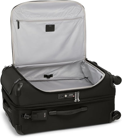 TUMI - Voyageur Leger 4 Wheeled Luggage - Women's Lightweight and Spacious, Sleek Silhouette, Durable Premium Suitcase - 29" Extended Trip Expandable Packing Case, Black with Gunmetal Hardware