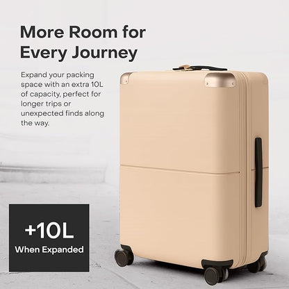 Checked Expandable - 24.5" Airline Approved Check In Luggage with Wheels, Spinner Suitcase for Men & Women - TSA Lock Rolling Suitcase, Spinner Wheels, Expansion Zip, Y-Strap - Sand