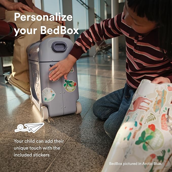 Stokke JetKids BedBox, Midnight Grey - Ride-On Suitcase for Kids 2-7 Years Old (up to 77 lbs) - Transforms Into Bed - Includes Mattress, Decorative Stickers & Adjustable Carrying Strap