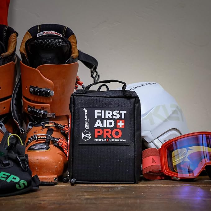 Uncharted Supply Co. First Aid Pro Kit for Emergency Preparedness Survival - Car, Backpacking, Hiking, and Camping - Compact, Lightweight, Water-Resistant - Fully Stocked