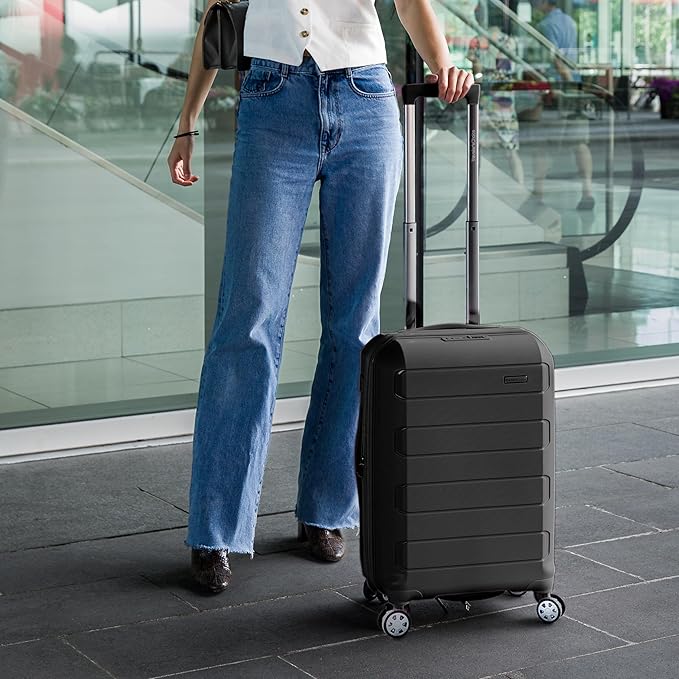 Traveler's Choice Pagosa Indestructible Hardshell Expandable Spinner Luggage, Black, 26-Inch Medium