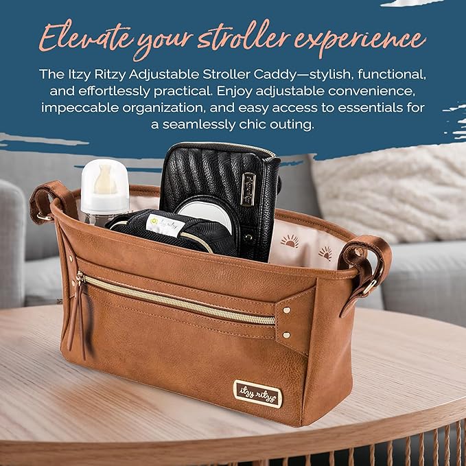 Itzy Ritzy Adjustable Stroller Caddy and Organizer Bag Featuring Front Zippered Pocket, 2 Built-in Interior Pockets & Adjustable Straps to Fit Nearly Any Stroller (Cognac)