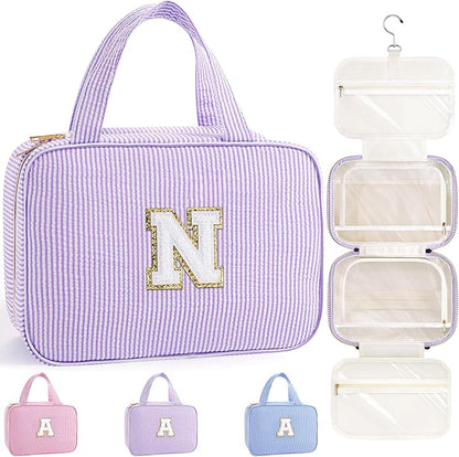 TOPEAST Hanging Toiletry Bag for Women - Travel Toiletry Bag Makeup Bag, Portable Toiletries Cosmetic Bag, Airplane Travel Essentials - Letter N, Purple