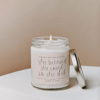 Sweet Water Decor, She Believed She Could So She Did, Tropical Fruit, Orange, Mountain Air, and Island Scented Soy Wax Candle for Home | 9oz Clear Jar, 40 Hour Burn Time, Made in The USA