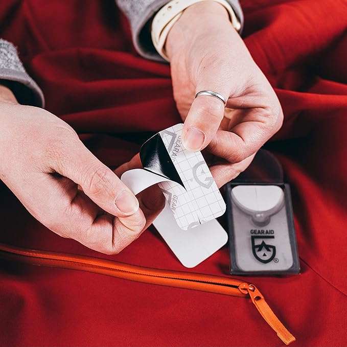 GEAR AID Tenacious Tape Mini Patches with Peel-and-Stick Adhesive to Fix Holes and Tears in Winter Gear, Down Puffer Jackets, Sleeping Bags, Tents, and Rain Gear, Black and Clear